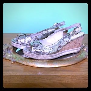 Faux brown and gold.  Worn once very comfortable